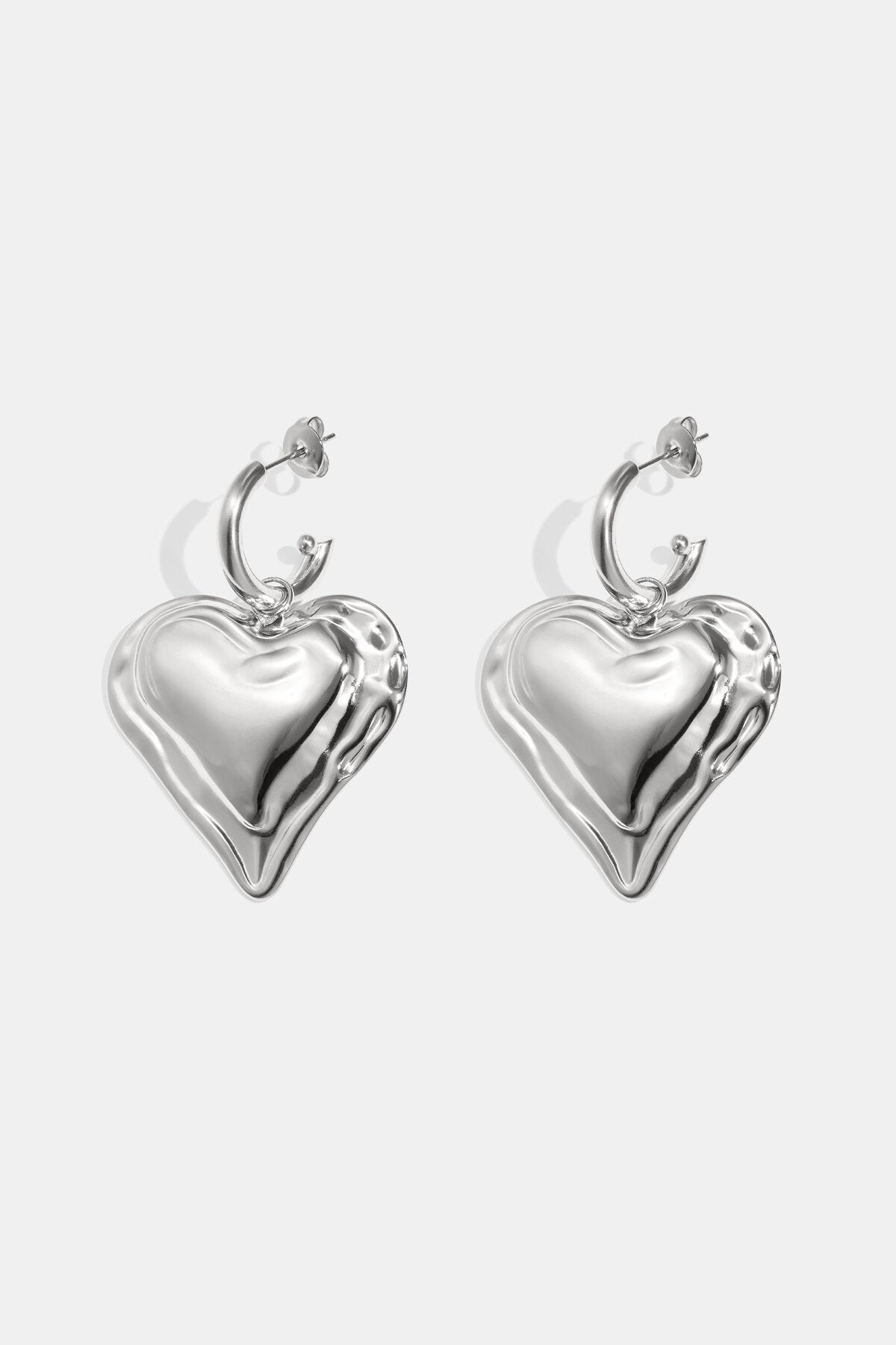 Earrings with large hanging heart