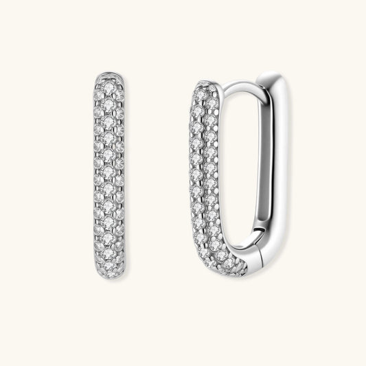U-shaped huggie hoop earrings featuring two rows of sparkling elements and a smooth polished back for effortless elegance.