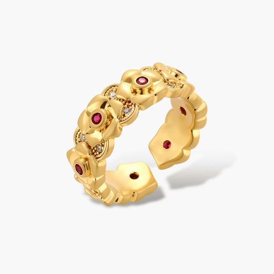Gold floral ring with red zirconia centres and clear stone accents, featuring an adjustable open band for a perfect fit.