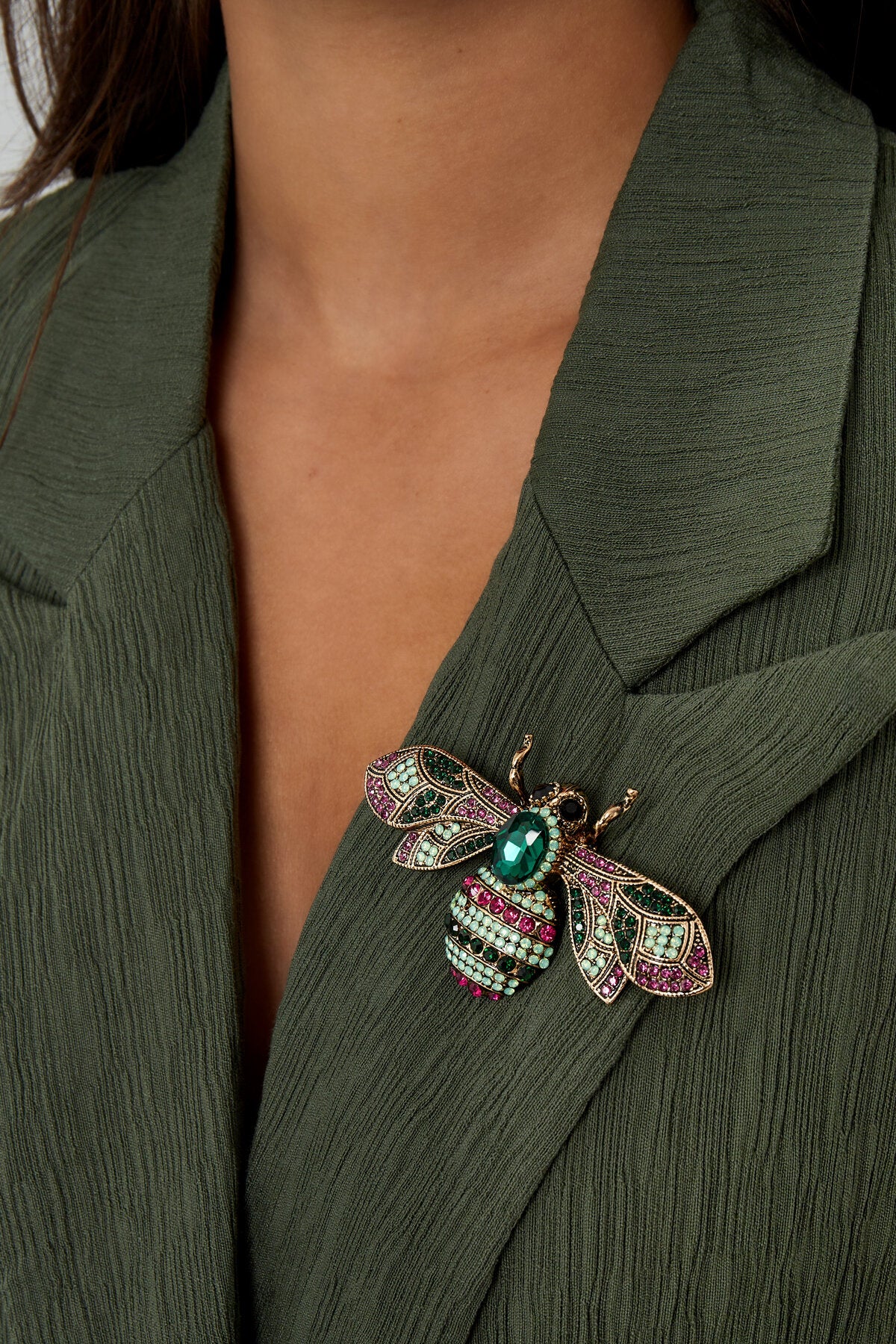 buzzy brooch