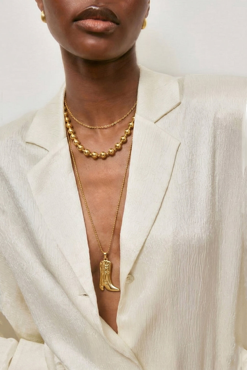 Long necklace with cowboy boot