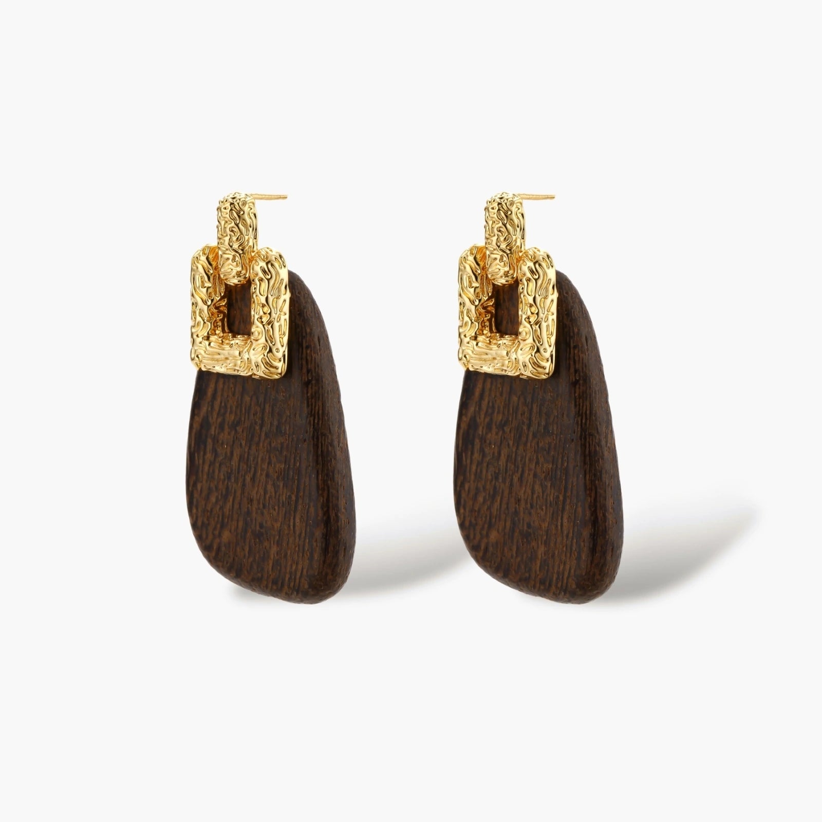 Elegant drop earrings featuring intricate 18k gold plated copper metalwork with dark brown wooden teardrop pendants
