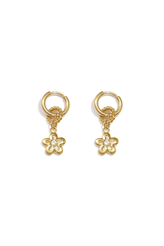 Earrings with a dangling daisy