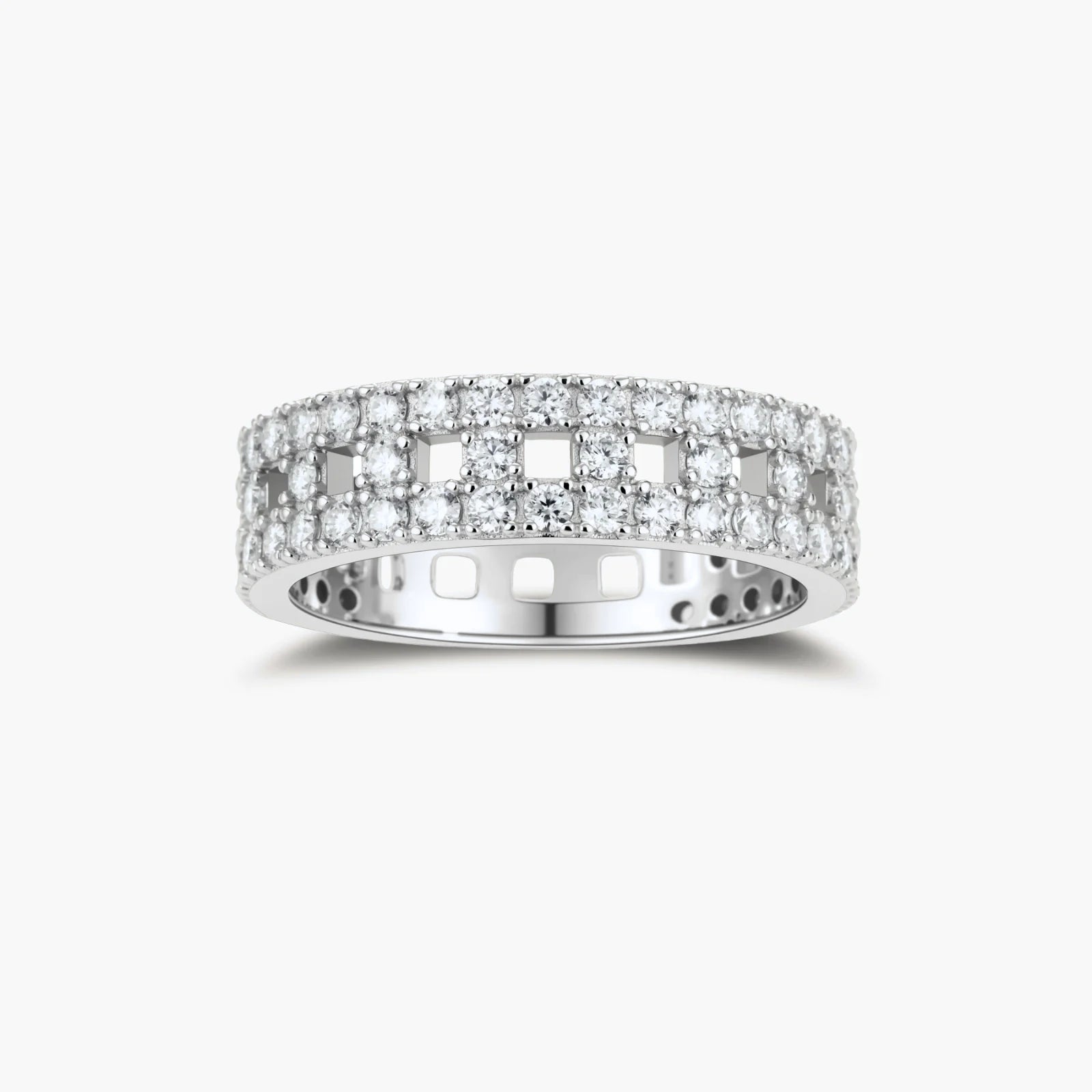 Wide sterling silver ring with three rows of brilliant moissanite stones in geometric pavé setting on white background