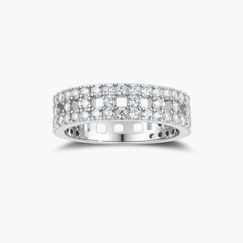 Wide sterling silver ring with three rows of brilliant moissanite stones in geometric pavé setting on white background