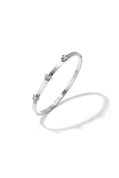 Bangle with floral detail and rhinestone