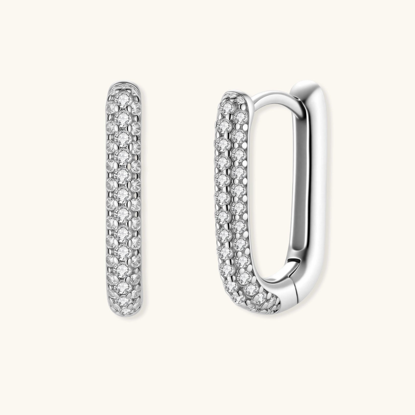 U-shaped huggie hoop earrings featuring two rows of sparkling elements and a smooth polished back for effortless elegance.