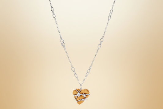 Adjustable brass chain necklace with natural wood heart pendant featuring wire wrapping and zirconia crystal accents