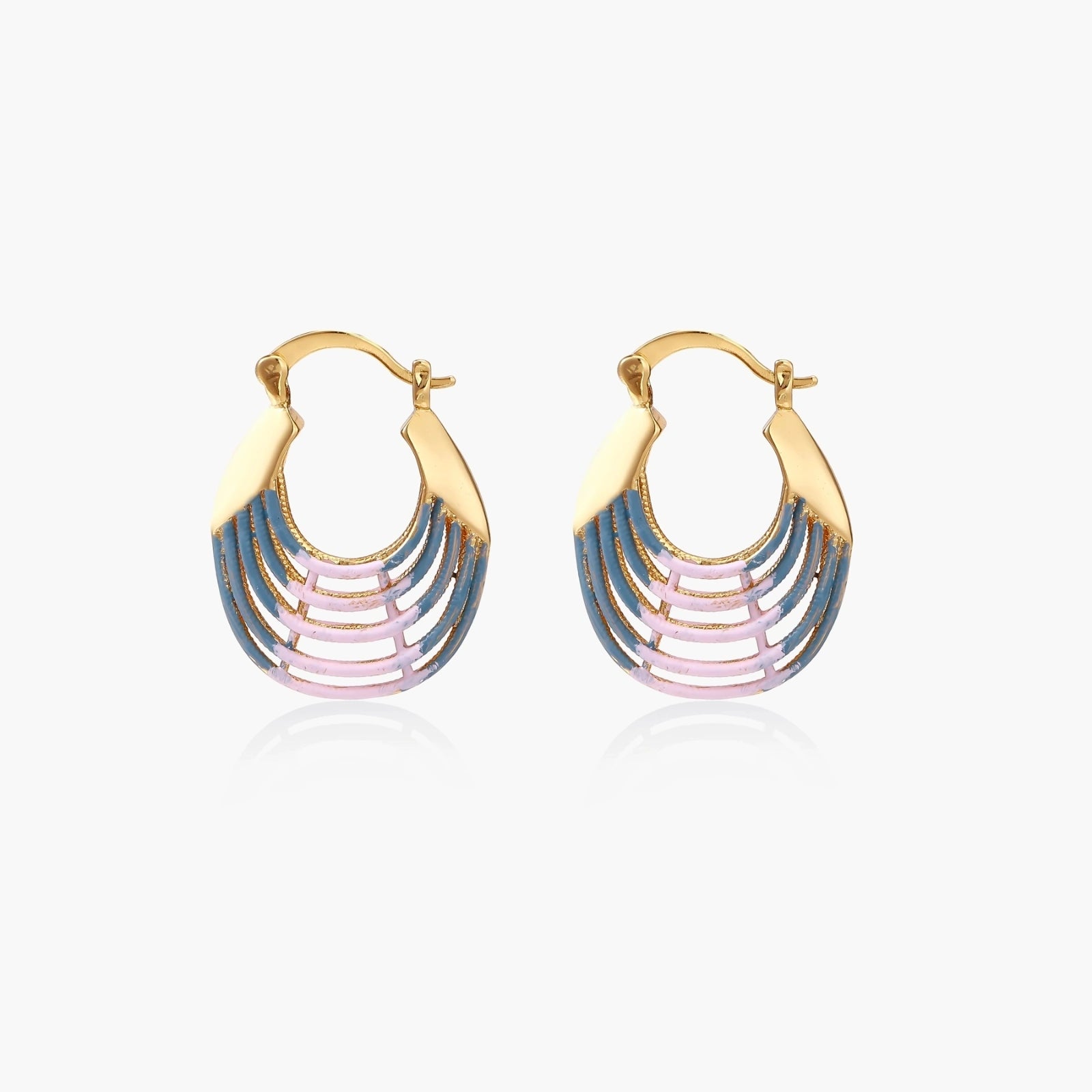 Gold hoop earrings with gradient blue-to-pink enamel in ribbed fan design on beige background