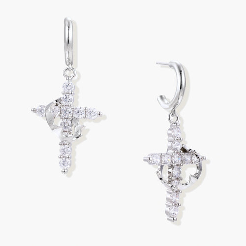 Hoop earrings featuring a swinging zirconia-set cross design with a sculpted motif, exuding elegance and sophistication.