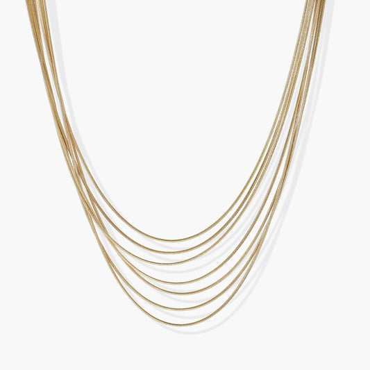Seven elegant gold-plated snake chains layered for a sophisticated look.