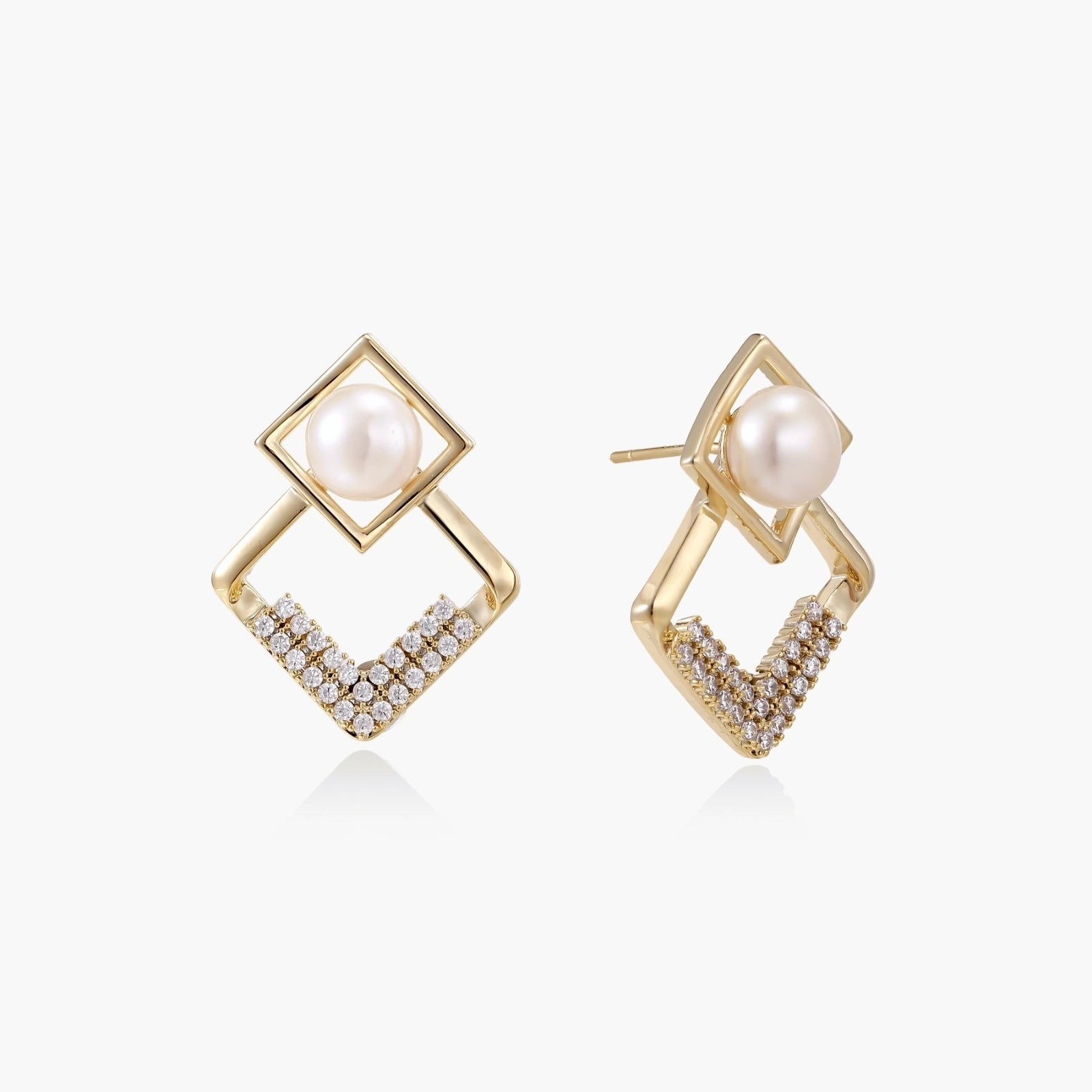 Geometric gold earrings featuring a round freshwater pearl and delicate crystal accents in an elegant V design.