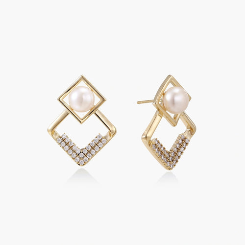 Geometric gold earrings featuring a round freshwater pearl and delicate crystal accents in an elegant V design.