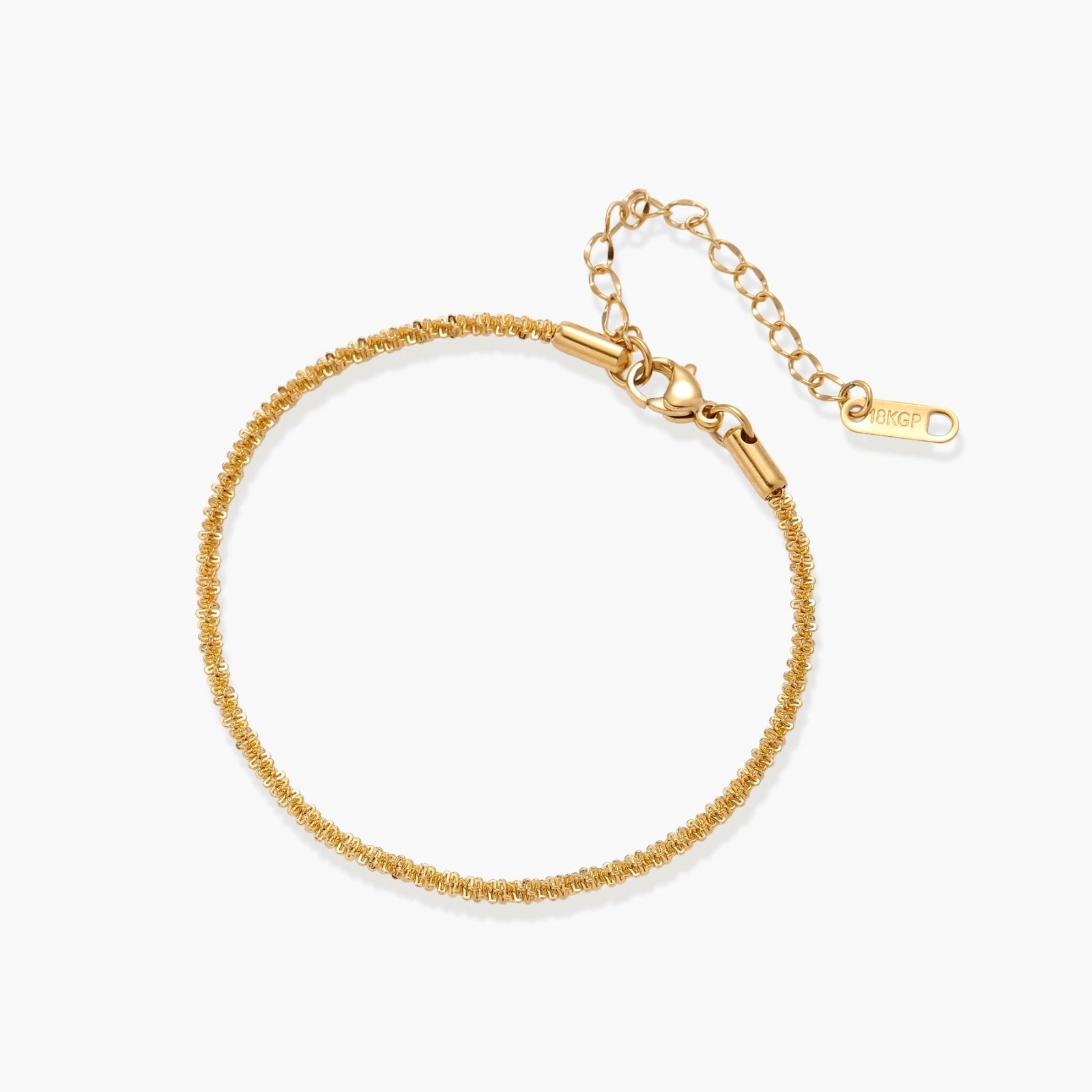 Delicate 18K gold-plated stainless steel bracelet with a textured chain and adjustable extender for a perfect fit.