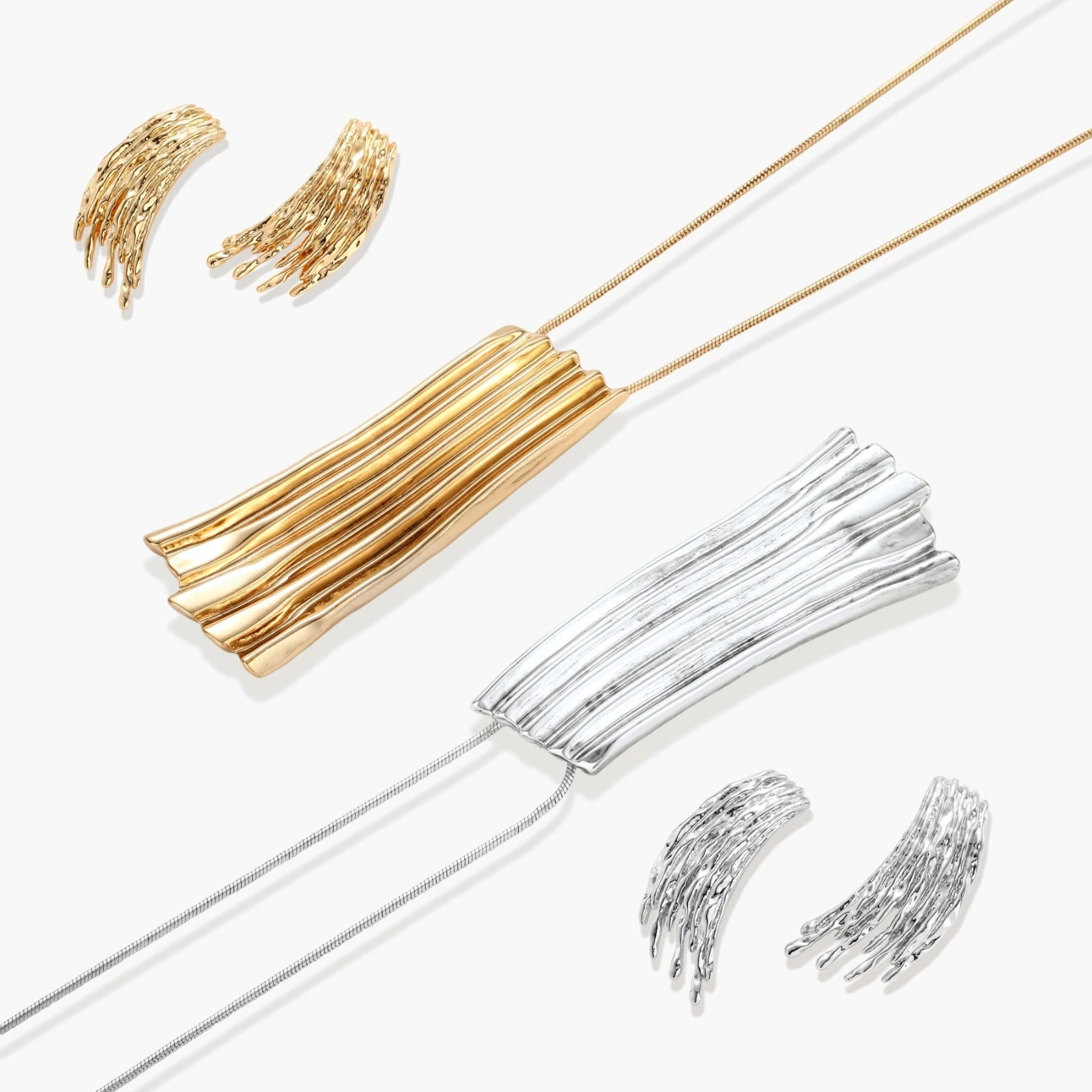Gold-toned cascade jewelry set with flowing textured strands, featuring drop earrings and matching pendant necklace