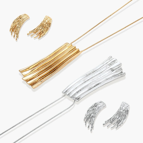Gold-toned cascade jewelry set with flowing textured strands, featuring drop earrings and matching pendant necklace