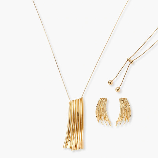 Gold-toned cascade jewelry set with flowing textured strands, featuring drop earrings and matching pendant necklace