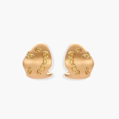 Organic-shaped stud earrings with flowing textural waves in eco-zinc alloy, featuring artistic curved design