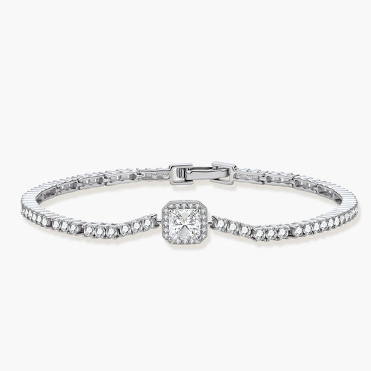Sterling silver tennis bracelet with cushion-cut moissanite centerpiece surrounded by smaller stones in continuous setting