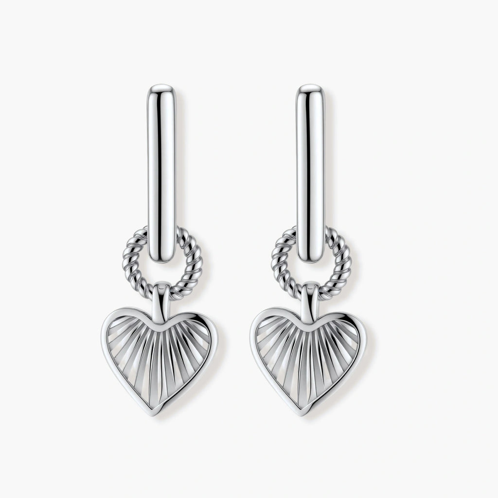 Platinum-plated 925 sterling silver rectangular hoop earrings with twisted ring connector and ribbed heart charm pendant.