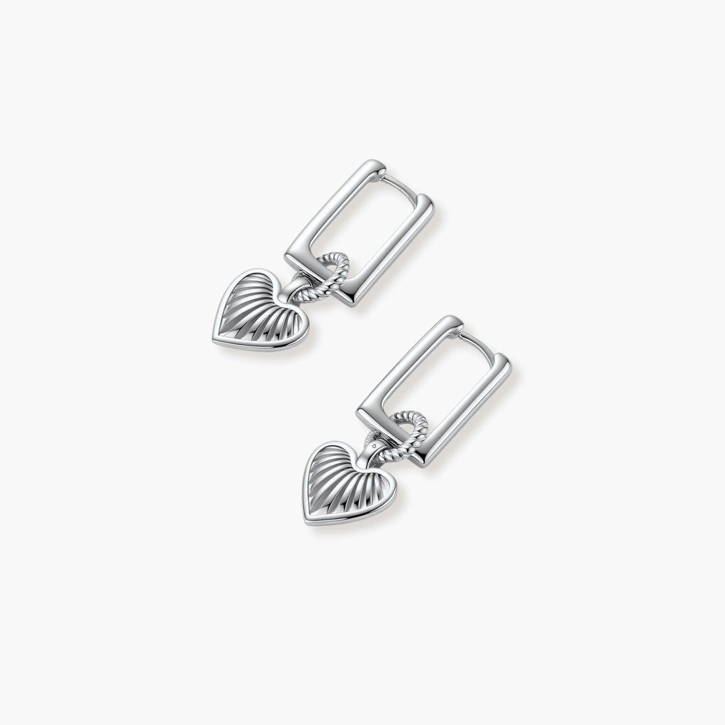 Platinum-plated 925 sterling silver rectangular hoop earrings with twisted ring connector and ribbed heart charm pendant.