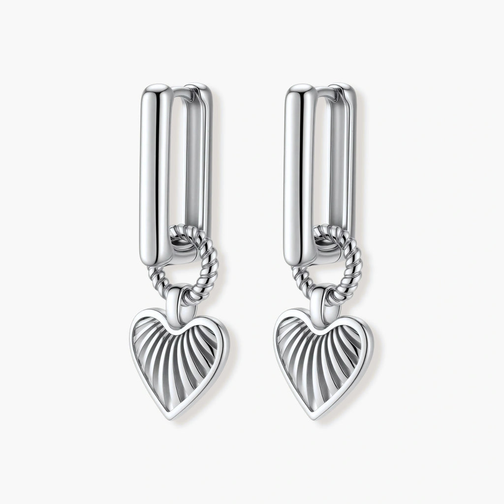 Platinum-plated 925 sterling silver rectangular hoop earrings with twisted ring connector and ribbed heart charm pendant.