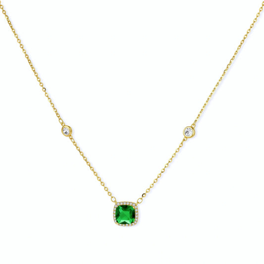 Delicate gold-plated necklace featuring a green cushion-cut pendant with a pavé halo and shimmering bezel crystals.