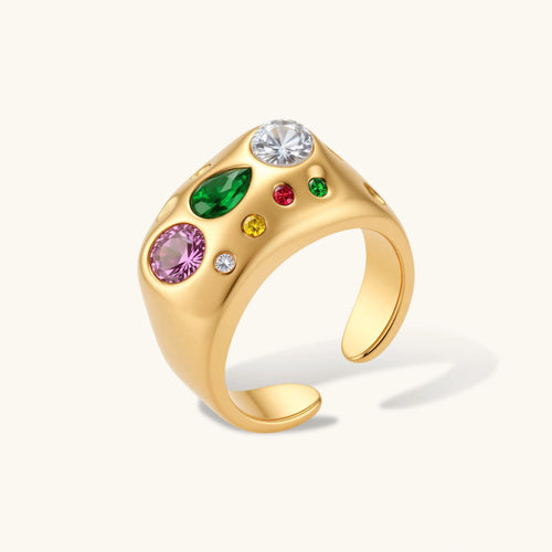 Chunky gold-plated dome ring featuring vibrant pink, green, red, yellow, and clear cubic zirconia stones.