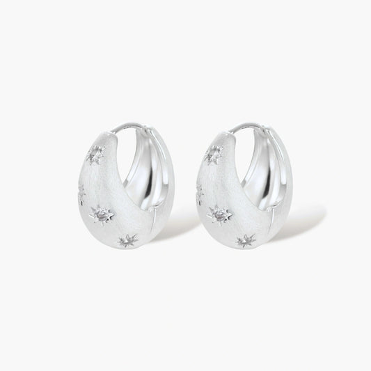 Silver-plated hoop earrings with star cutout designs, shown open and closed on white background, 17mm diameter.