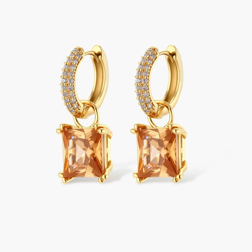 14K gold plated jewelry set featuring square champagne CZ stones with sparkling huggie earrings on cream background.