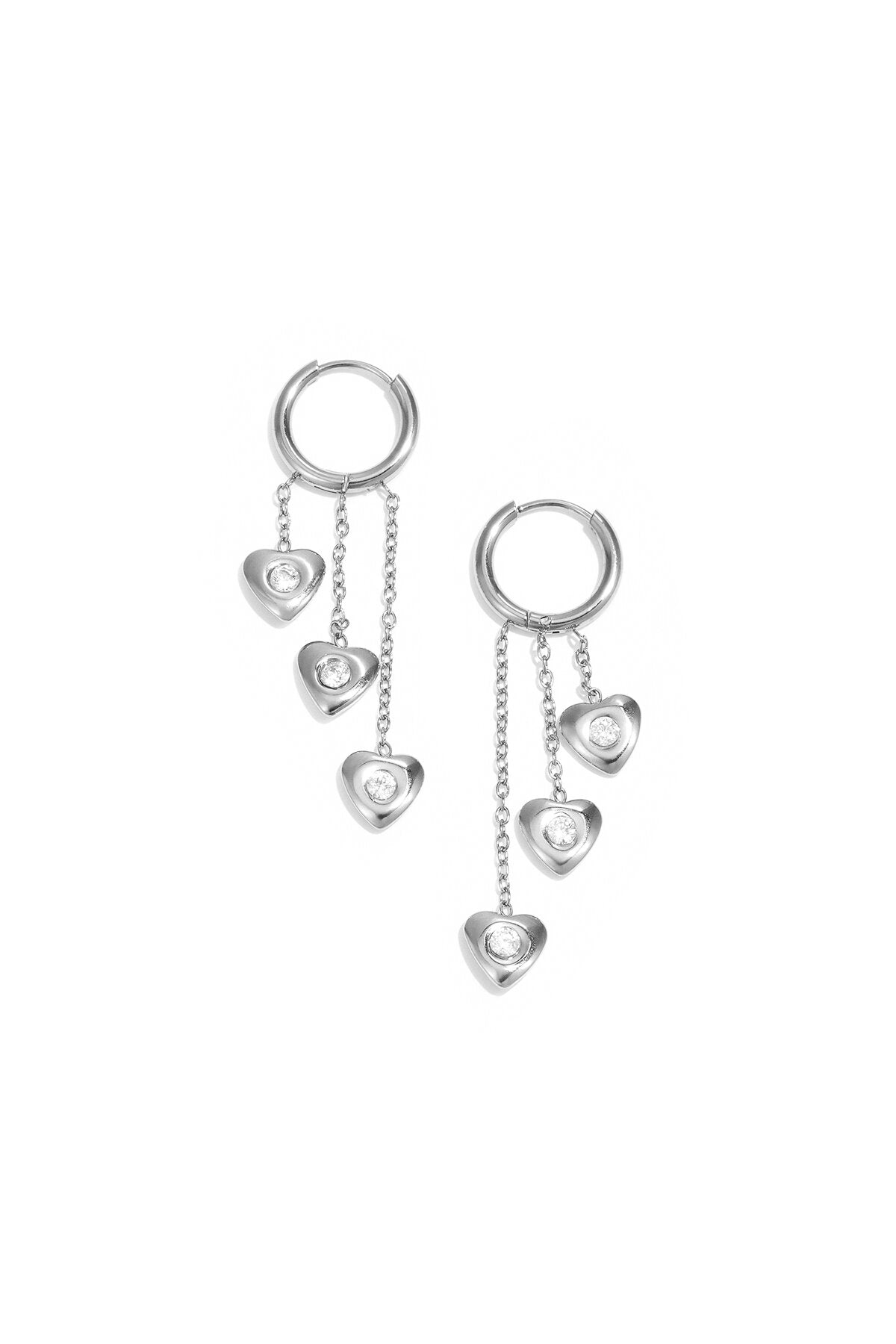 Earrings with dangling hearts at different heights