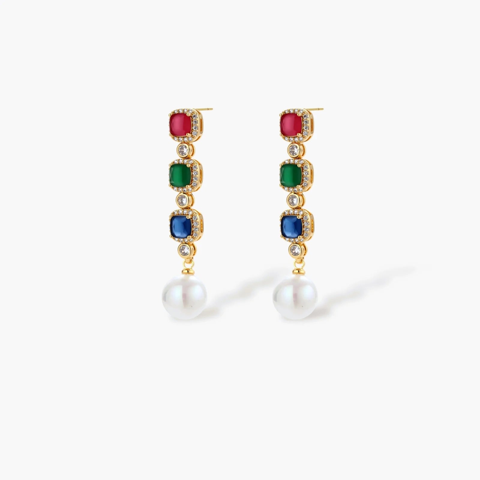 Gold-plated jewelry set with red, green, and blue cubic zirconia stones including necklace, bracelet, and drop earrings.