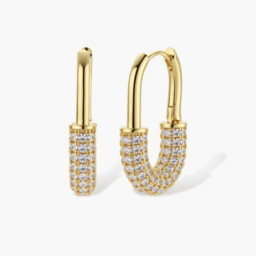 Polished gold huggie hoop earrings featuring multiple rows of sparkling stones in an elegant U-curve design.