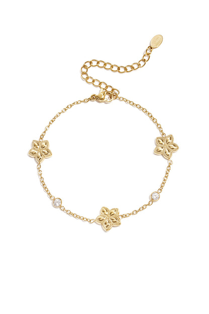 Bracelet with an alternating pattern of flowers and stones