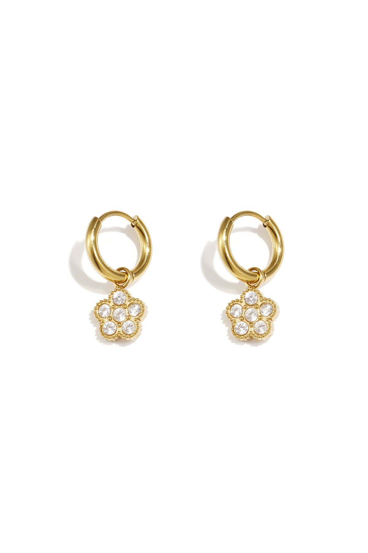 Small hoop earrings with hanging flowers made of zirconia stones