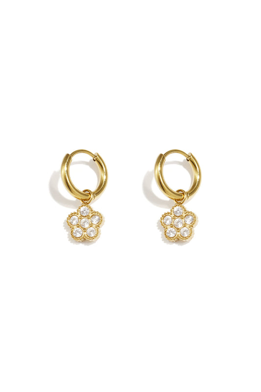 Small hoop earrings with hanging flowers made of zirconia stones