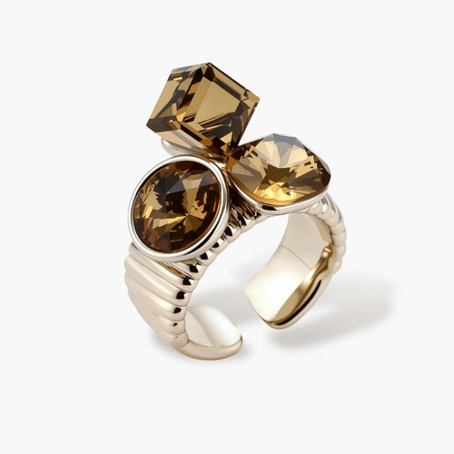 Silver-plated adjustable cocktail ring featuring three golden-brown zirconia stones in mixed cuts on textured band