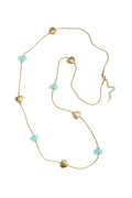 Long necklace with varying beads and shapes