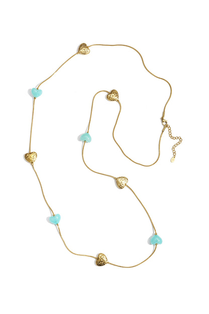 Long necklace with varying beads and shapes