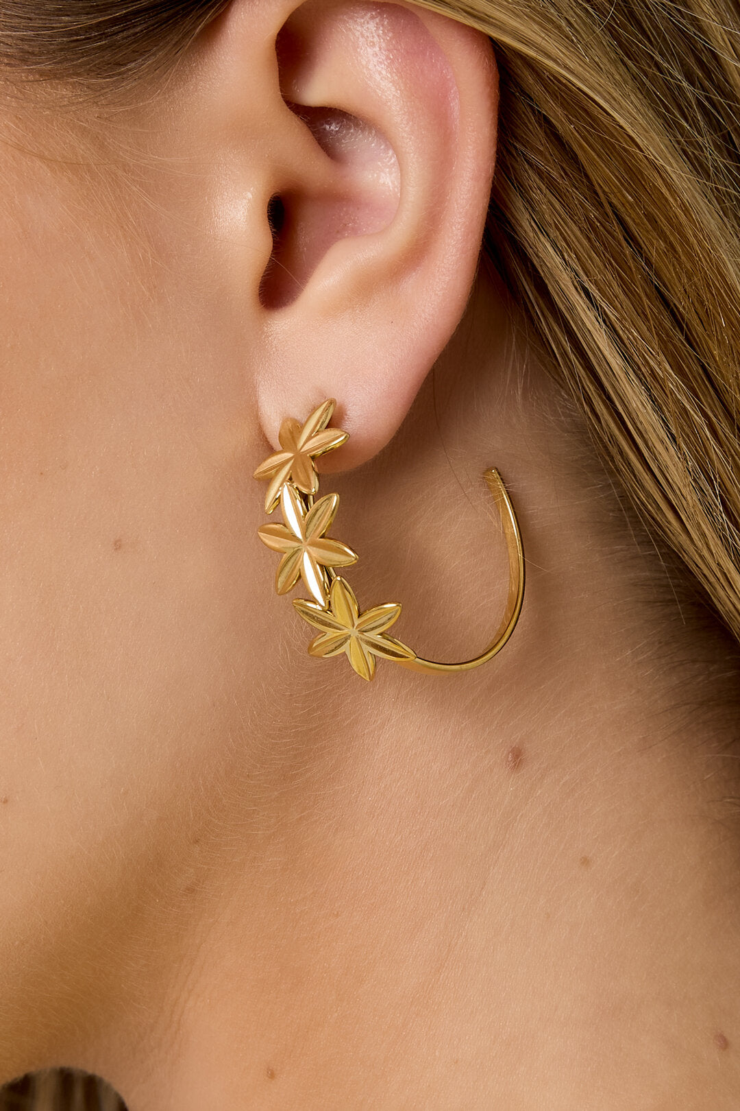 Hoop earrings adorned with flowers