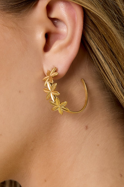 Hoop earrings adorned with flowers