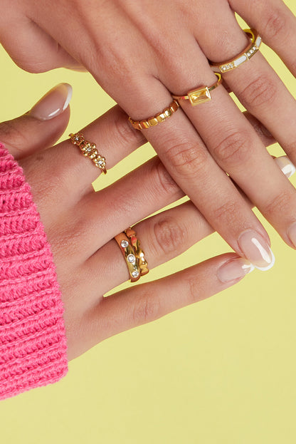 Minimalist ring with small hearts