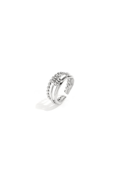 Layered ring with minimalist twisted detail