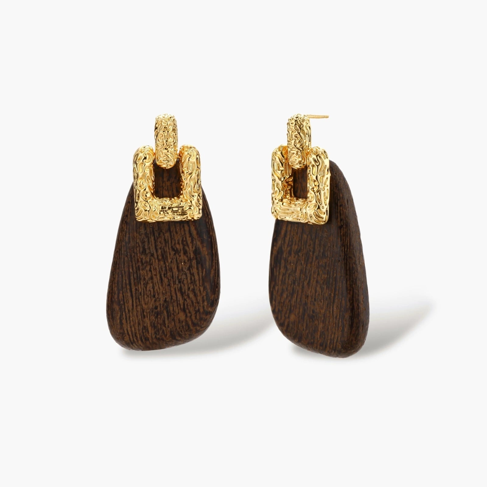 Elegant drop earrings featuring intricate 18k gold plated copper metalwork with dark brown wooden teardrop pendants