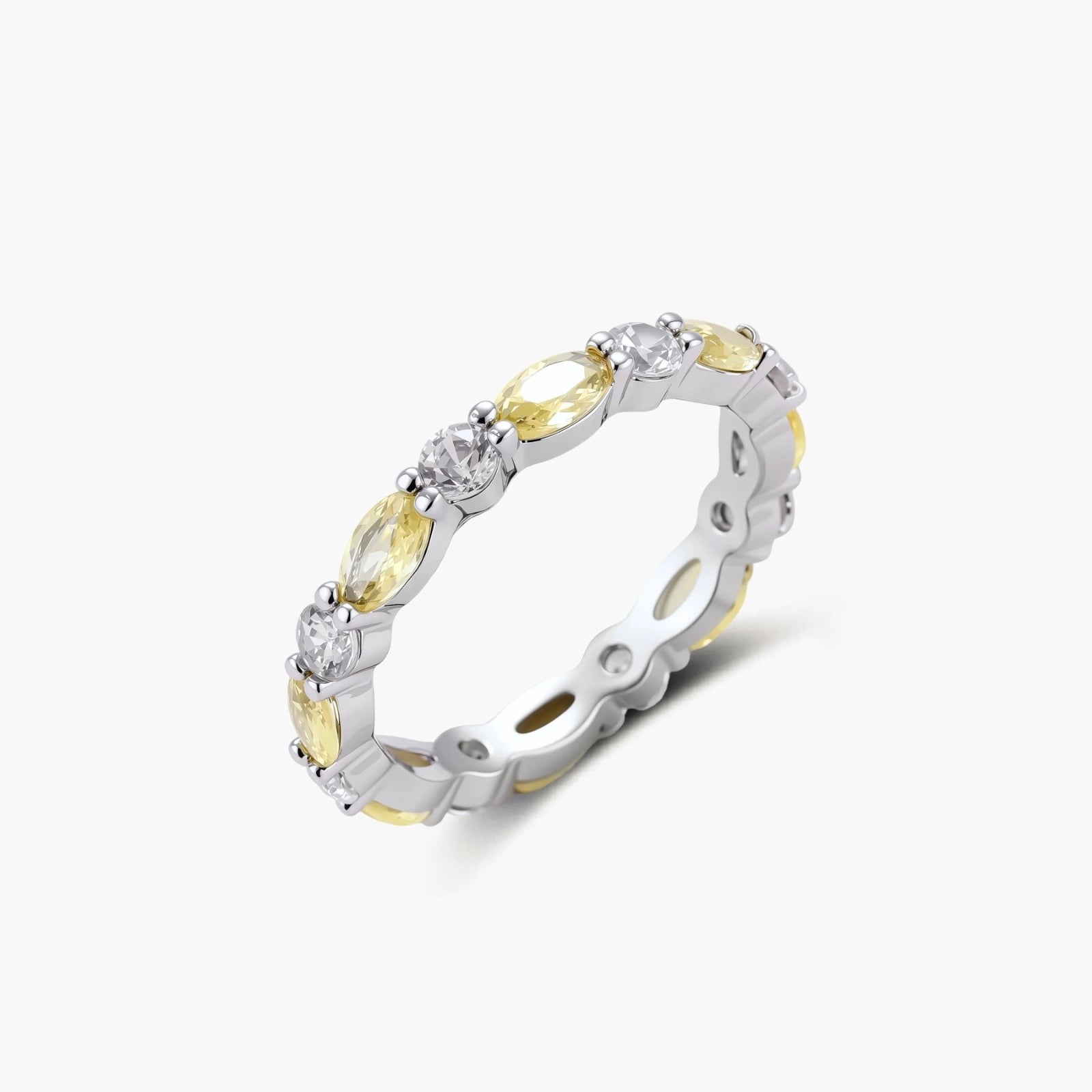 Platinum-plated copper ring with alternating clear and pale yellow oval stones in an eternity band design on white background.