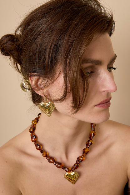 Earrings with large hanging heart