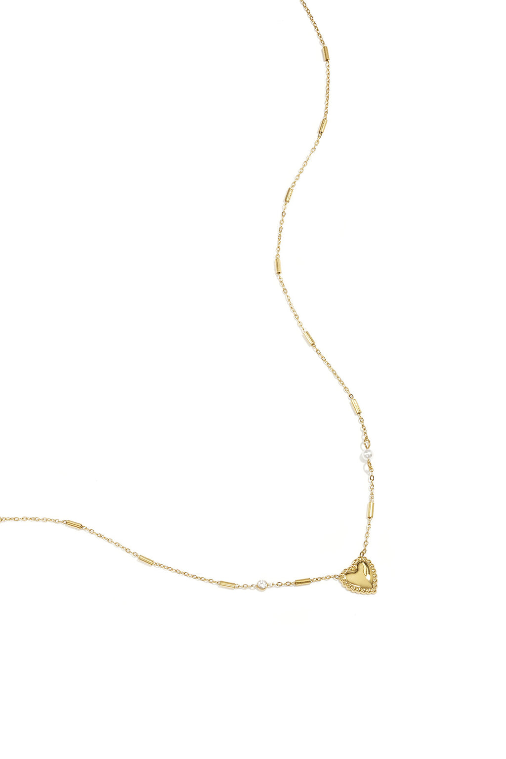 Necklace with pearl, stone and statement heart