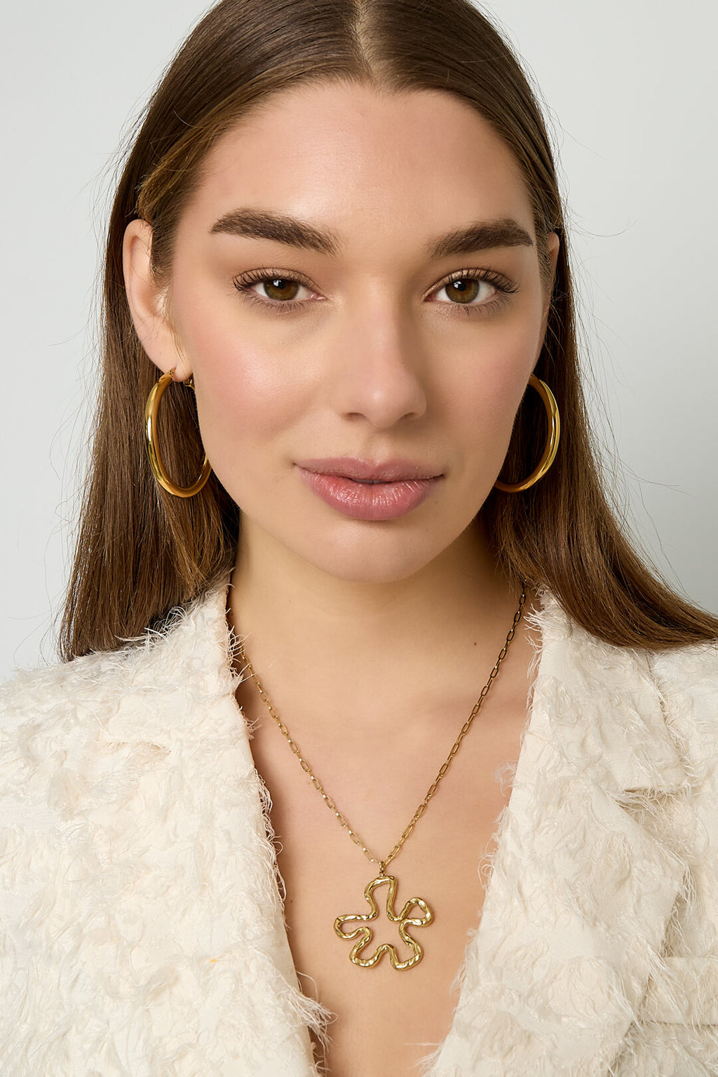 Necklace with hanging flower charm